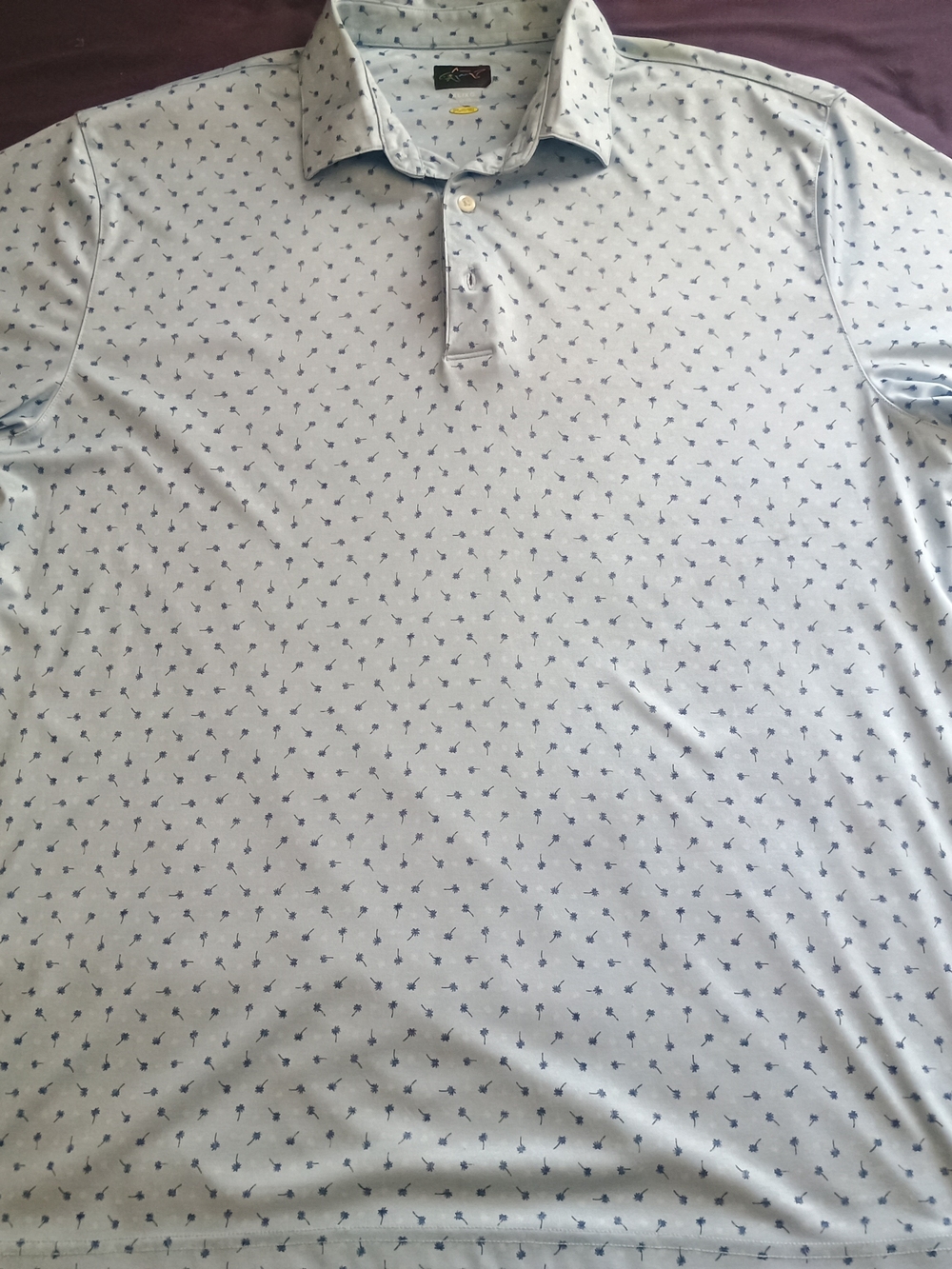 Greg Norman Collection Light Blue Polo with Navy Micro Pattern